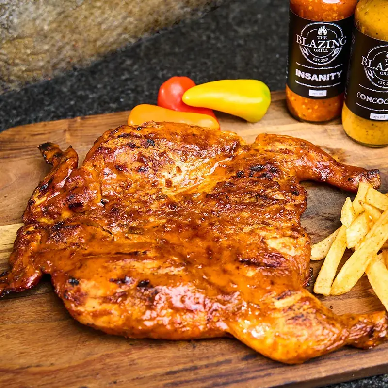 The Blazing Grill flame grilled chicken